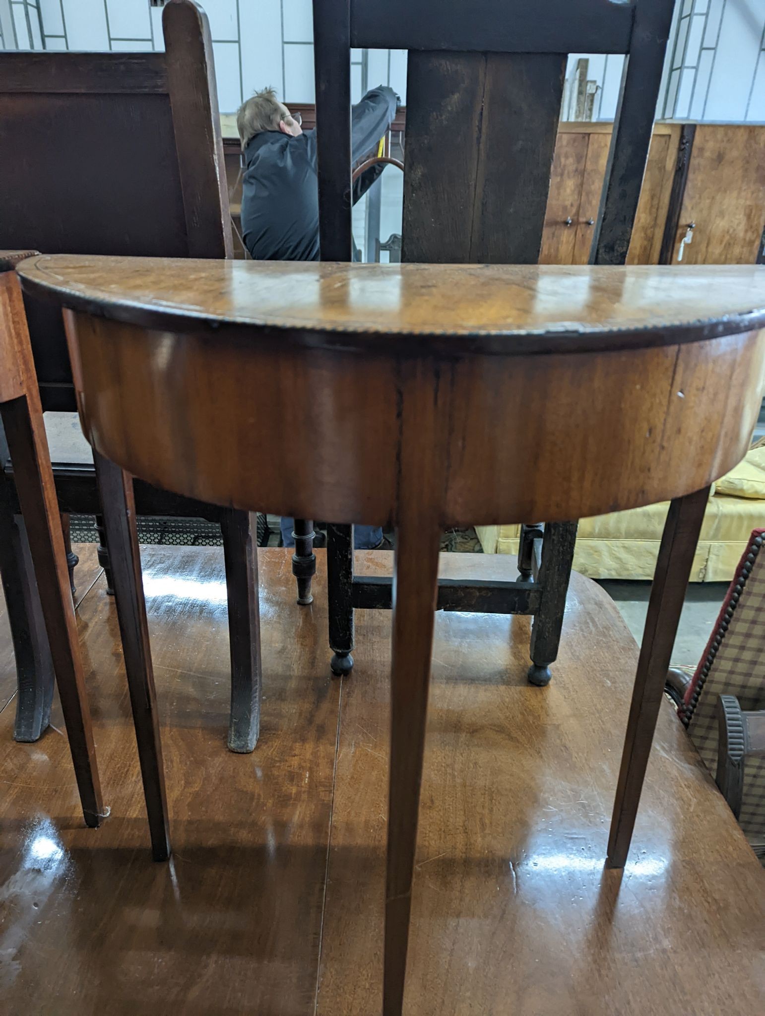 A pair of George III style inlaid mahogany D shaped side tables, width 64cm, depth 32cm, height 71cm
